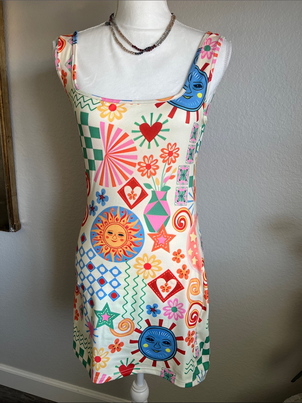 Bright Sun & Moon Pattern Sleeveless Dress